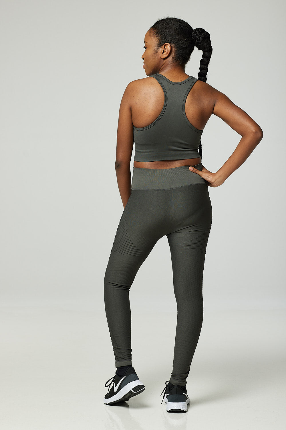 Back of model wearing Iron grey gym set