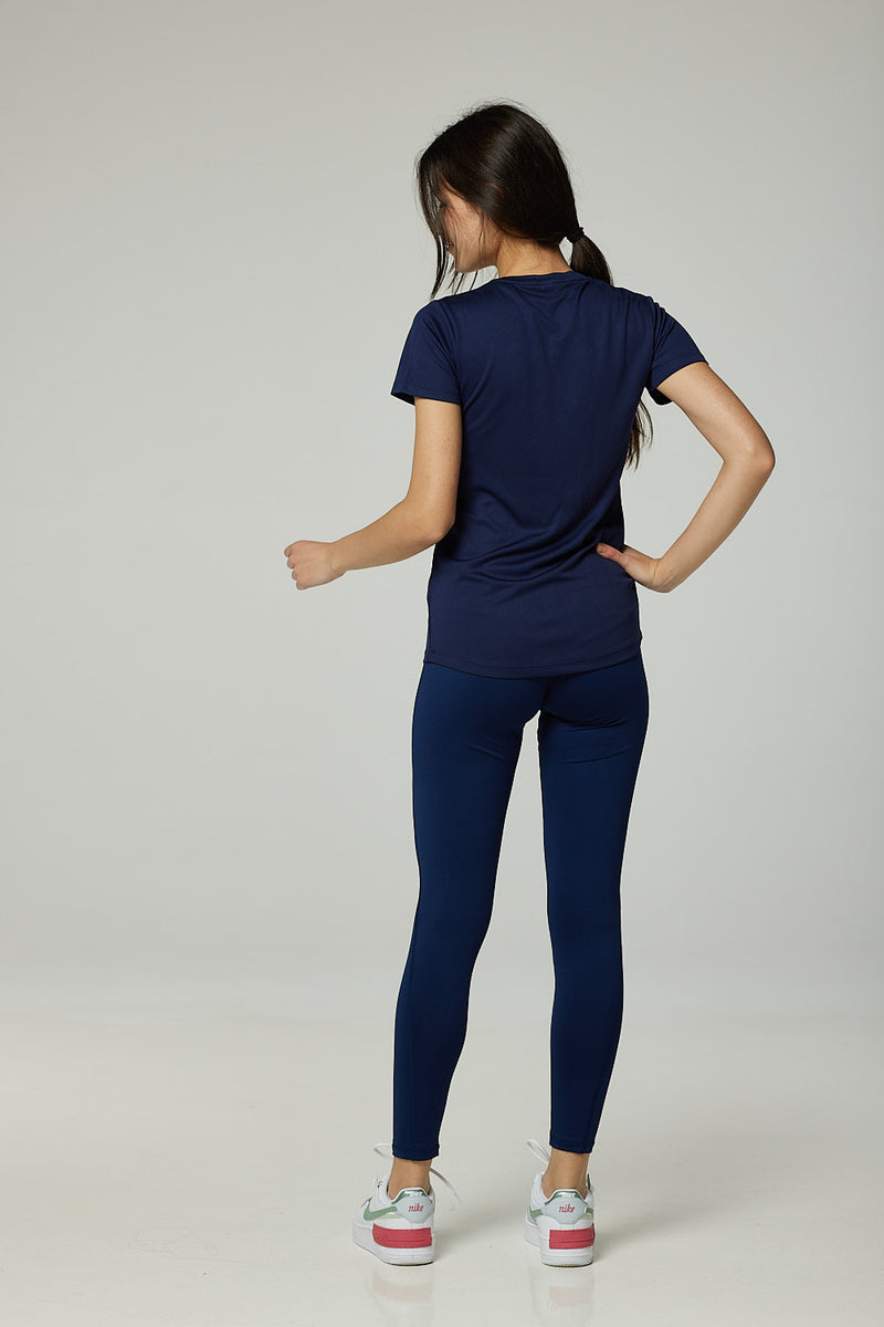 Back of Navy blue t-shirt and workout leggings
